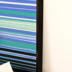 Macro shot of Blues Harmony wall art showing intricate stitch detail and dove grey stripe fibers for subtle contrast