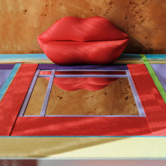 Close‑up of Bohemian Reverie yarn mirror art revealing tight looped wool texture and crisp transitions between pastel and red stripes.