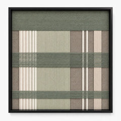 Frontal studio shot of the Celadon Mist square hand-woven textile wall art featuring sage green, beige, and cream geometric plaid patterns in a black frame.