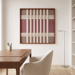 The Dusty Tones hand-woven tapestry creates a calm focal point above a wooden desk in a stylish, minimalist home office.