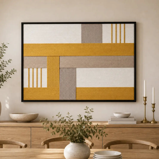 Earth-toned geometric hand-woven wool tapestry beautifully staged in a warm dining room, hanging over a rustic wooden sideboard.