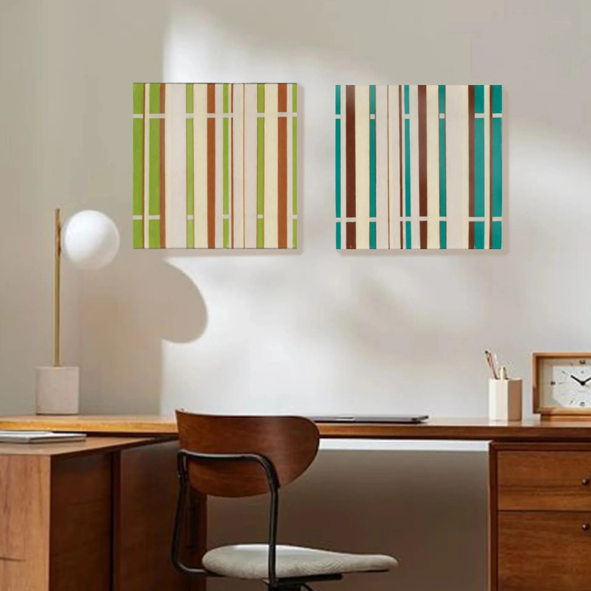 March Tree hand-woven yarn wall art featuring alternating spring green, mint, and white vertical stripes in a natural wood frame, displayed above a desk lamp and chair.