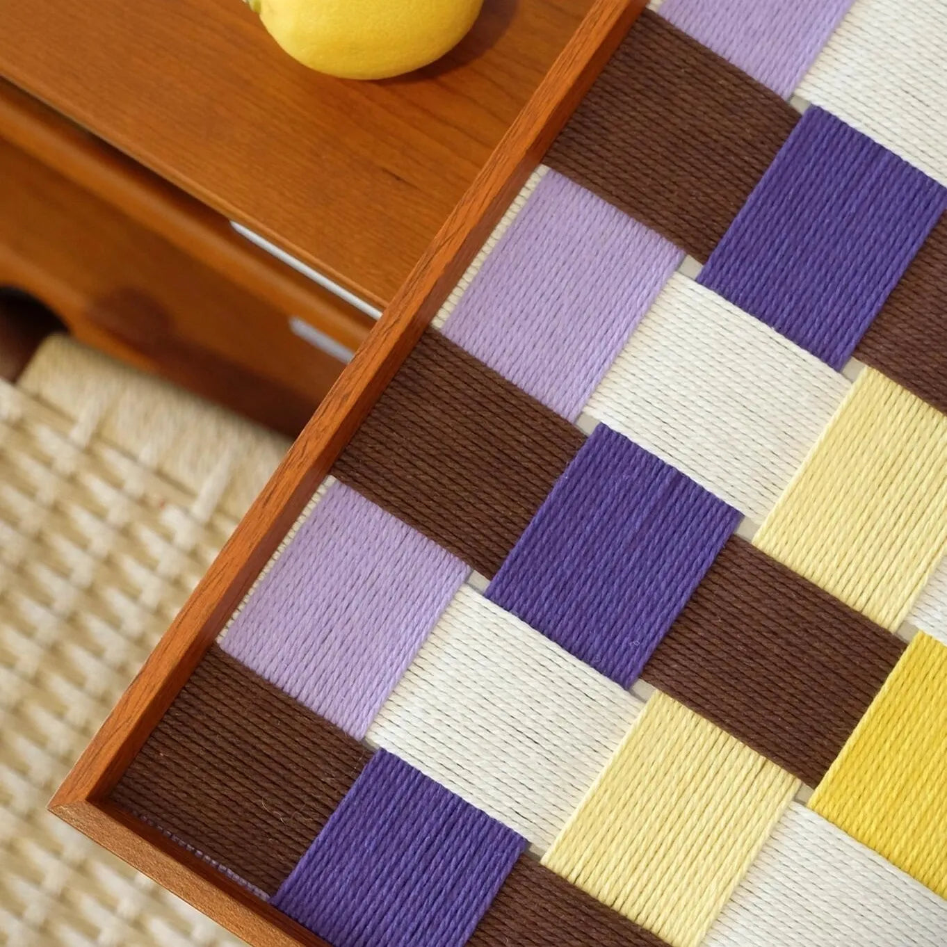 Overhead flat lay of Mrs Dalloway wall art alongside stationery and office supplies.
