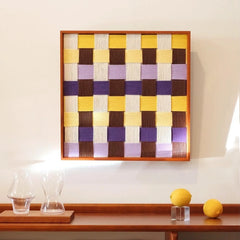 Mrs Dalloway wall art styled on a table with a glass vase and lemon decor.