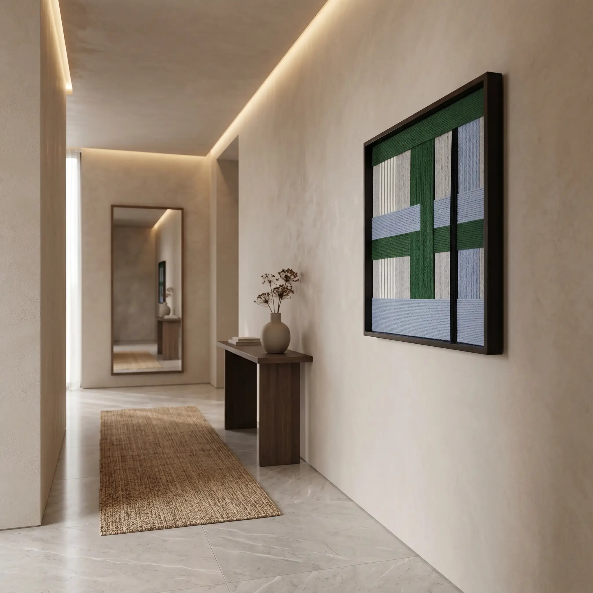 "Polar Forest" textured fiber art displayed in a bright home foyer above a minimalist console table with warm interior lighting.