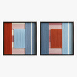 Front studio view of the Cold Fire two-piece textured textile wall art set with red and blue geometric color blocks in black frames on a white background.