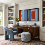 Framed Cold Fire textile wall art with aqua, hazy blue, terracotta, white, and dusty rose blocks in a refined room.