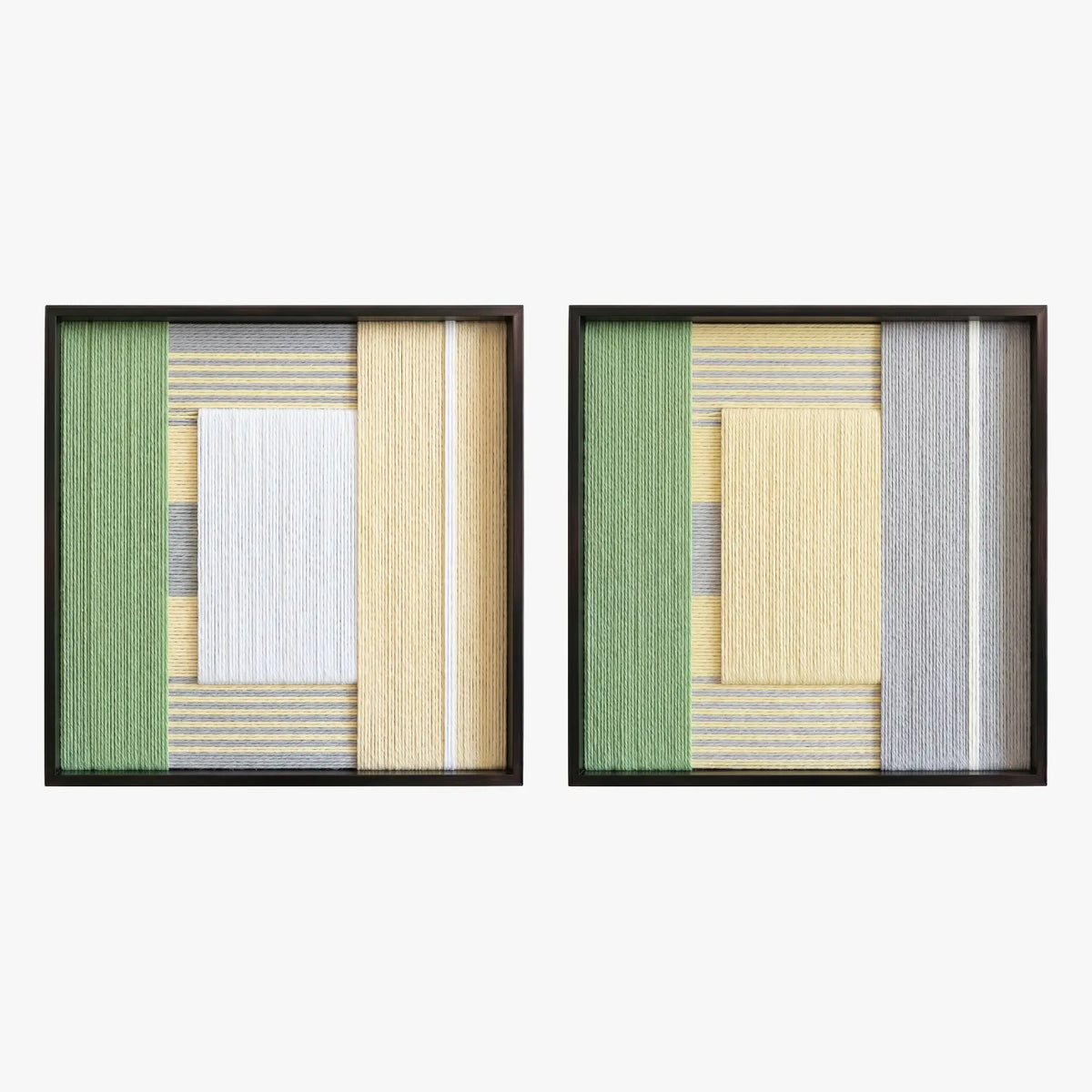 Front studio view of the Sun-Baked textile art pair with yellow, white, and sage green geometric designs in black frames on a white background.