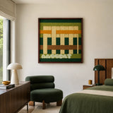 Primitive Pulse green amber and cream textile wall art featured in a modern bedroom with forest green furnishings.