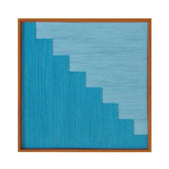 Radiant Azure hand-woven yarn wall art front view on plain white background, showcasing the square gradient pattern and minimalist wood frame