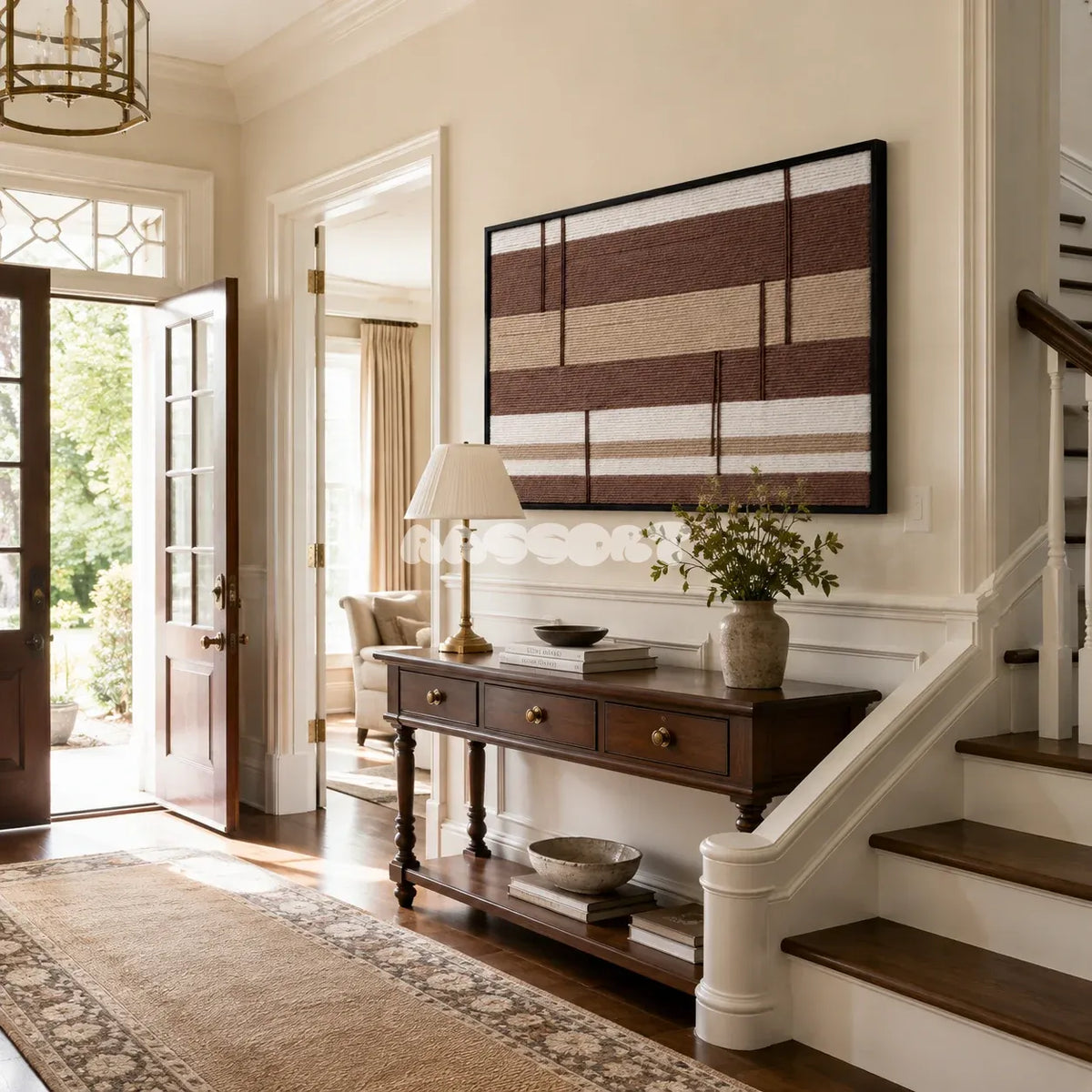 Cocoa Strata geometric fiber art with broad cocoa brown and cream stripes displayed in a neutral interior.