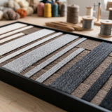 Angled detail of Umber Columns textile art showing its raised dimensional soft cotton cord texture.