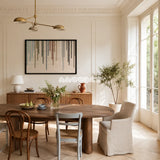 Chromatic Rain tactile yarn wall decor bringing gentle movement and color to a neutral interior.