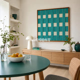 Reef Echoes teal and seafoam textile wall art featured above a light wood sideboard in a fresh modern dining room.
