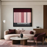 Rosy Pulse dusty rose burgundy and charcoal textile wall art styled above a curved blush sofa in a sophisticated modern living room.