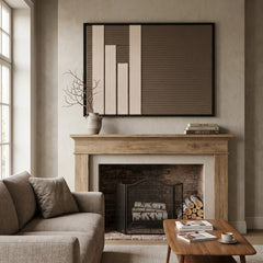 The Silent Stelae rectangular hand-woven tapestry creates a calm atmosphere mounted above a rustic stone fireplace mantel in a modern home.