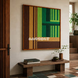 Summer Mountain Walk SQ032 green brown and tan framed yarn art above a rustic wood bench in a warm modern entryway