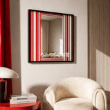 Wave Tide SQ035 red and white striped framed yarn mirror art above a cream boucle chair in a sunlit reading corner