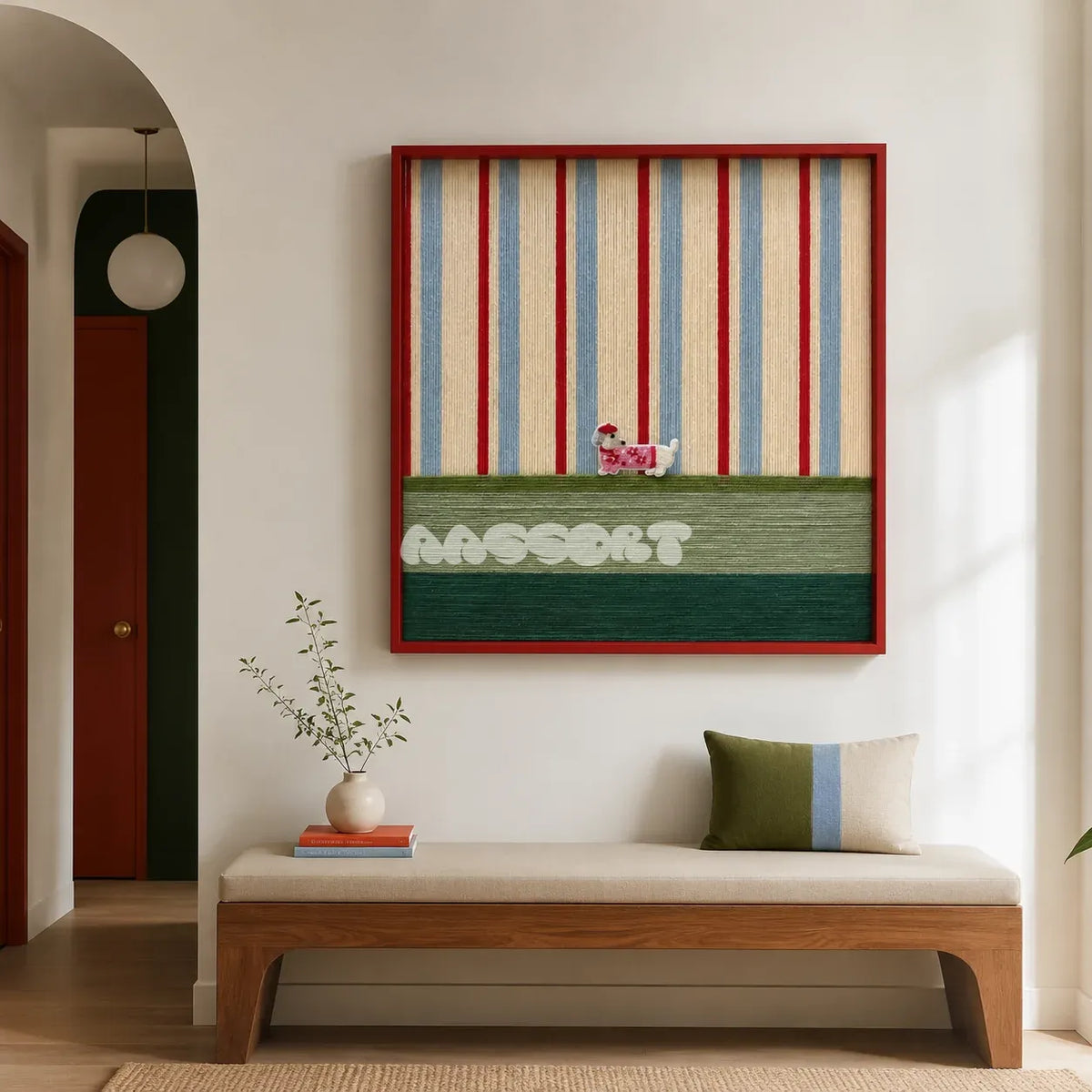 Scarlet Stripe Pup Saunter SQ045 red blue cream and green framed yarn art with a dog motif above a wood bench in a bright entryway
