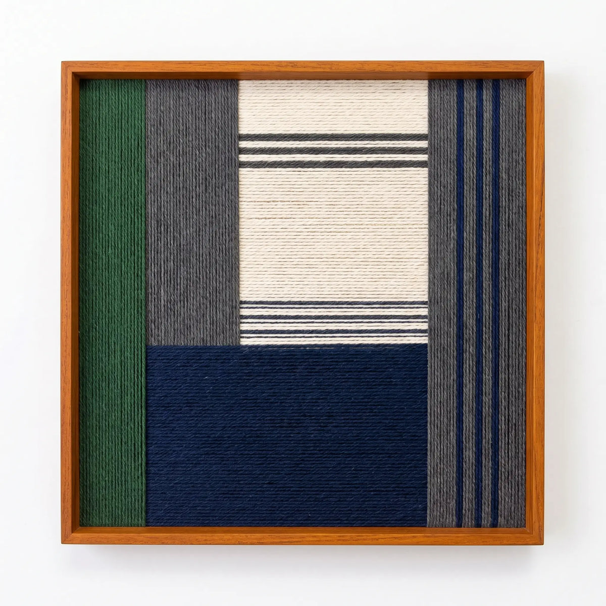 Front view of Needle and Ink SQ085 geometric yarn wall art in a sleek square frame on a white background.