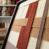 Angled close-up of Captured Radiance SQ091 showing dense soft cotton cord and intricate geometric texture.