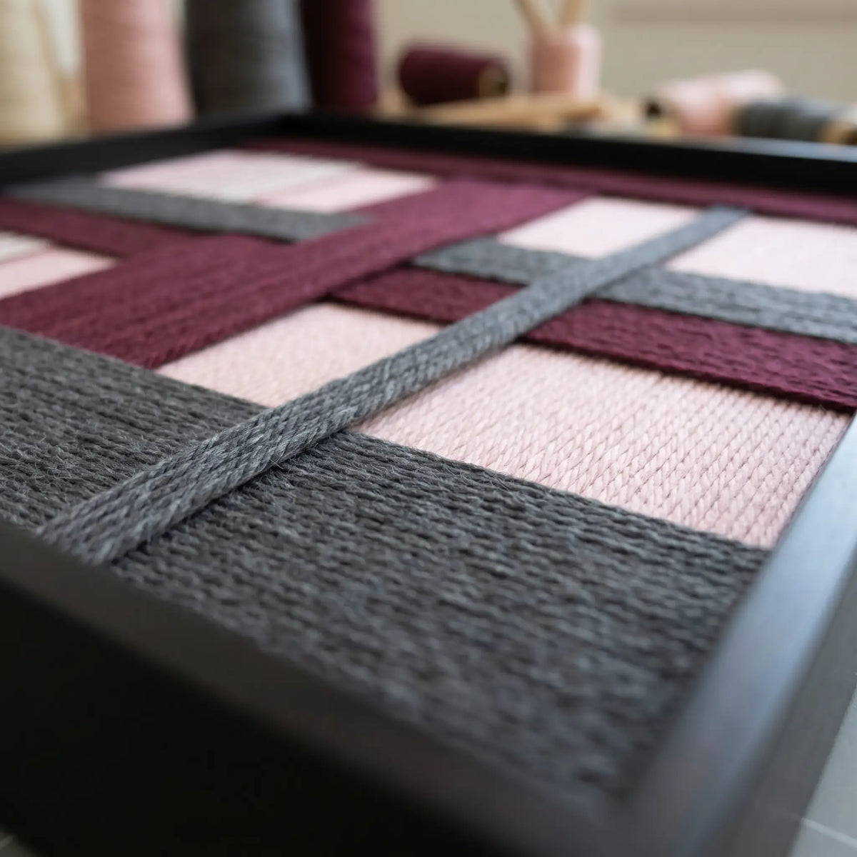 Angled view of Rose Coordinates SQ093 highlighting interlocking soft cotton cord and dimensional craftsmanship.