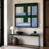 Polar Forest SQ094 framed textile art with white, ash gray, forest green, misty blue, and charcoal yarn layers.