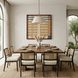 Breathing Shallows SQ105 beige and blue textile wall art displayed above a wooden dining table.