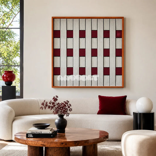 Ruby Lattice SQ106 framed textile art with deep ruby red, crisp white, and black interwoven yarn.
