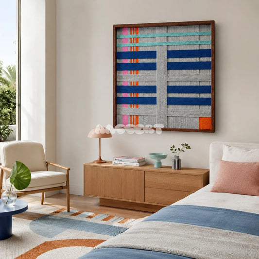 Silent Dopamine SQ108 framed textile art with light gray, cobalt blue, aqua, pink, and orange geometric yarn.
