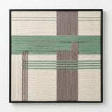 Front view of Muted Spring SQ115 sage, gray, and cream yarn wall art in a black frame on a white background.