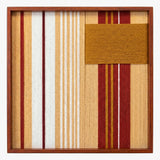Front view of Carmine Pulse SQ121 red, white, beige, and mustard geometric yarn wall art in a frame.