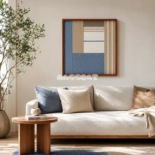 Cerulean Mist SQ130 framed textile art with cerulean blue, sandy beige, crisp white, and earthy taupe geometric yarn.