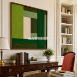 Garden Grid SQ148 contemporary fiber wall art with layered green and natural cream architectural geometry.