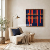 View of Silent Axis framed textile wall art, featuring navy, terracotta, and wheat yellow cotton cord arranged in an architectural grid.