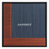 Held Space, framed textile wall art with navy blue fibers bordered by rust-orange bands.