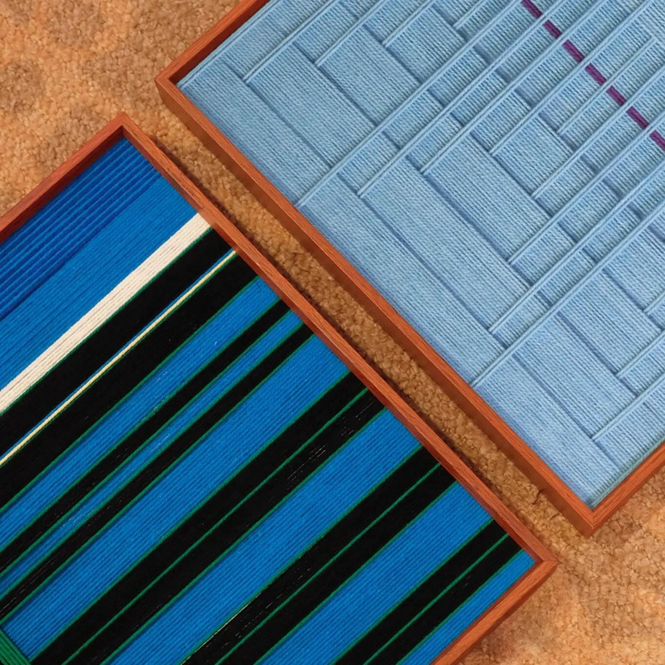 Close-up of Summer Night’s Serenity wool yarn showing tight looped texture and seamless transitions between navy, forest green, and mint accent fibers