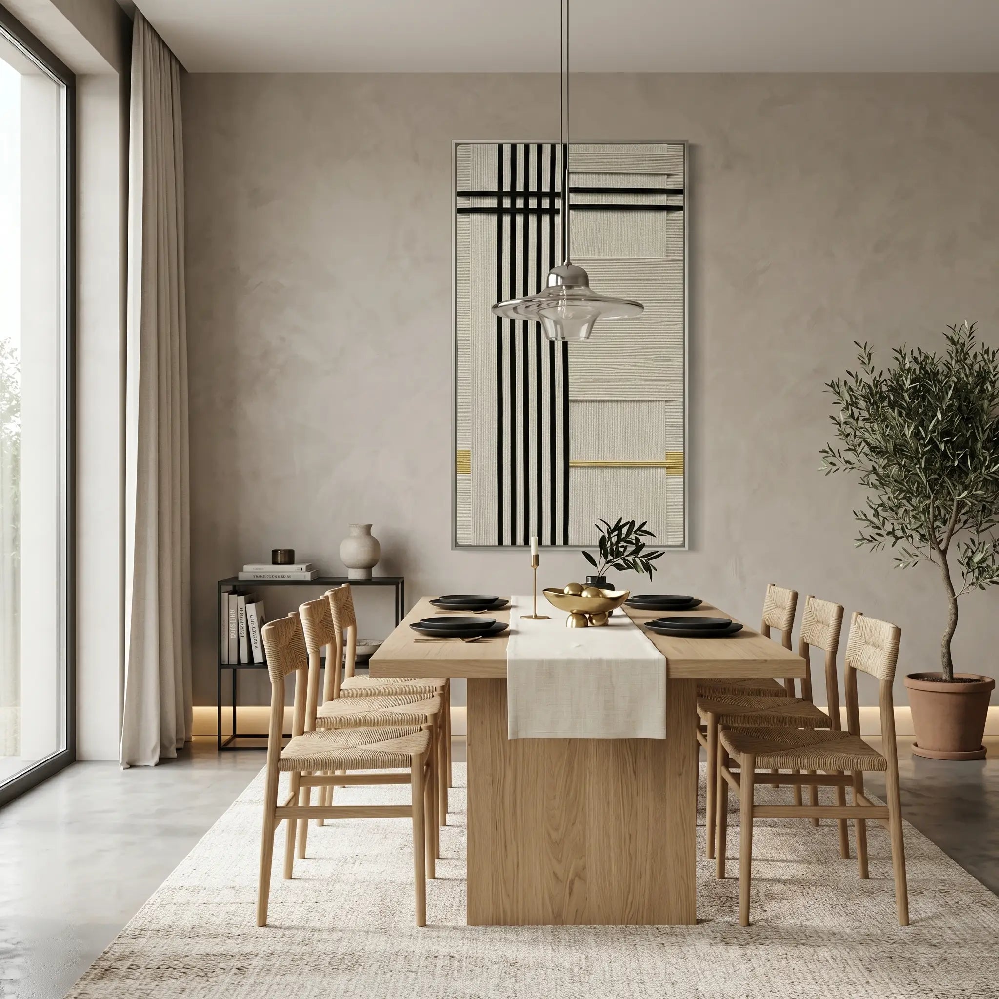 A large-scale textured fiber wall art piece acting as a focal point in a spacious, contemporary dining room with a long wooden table.