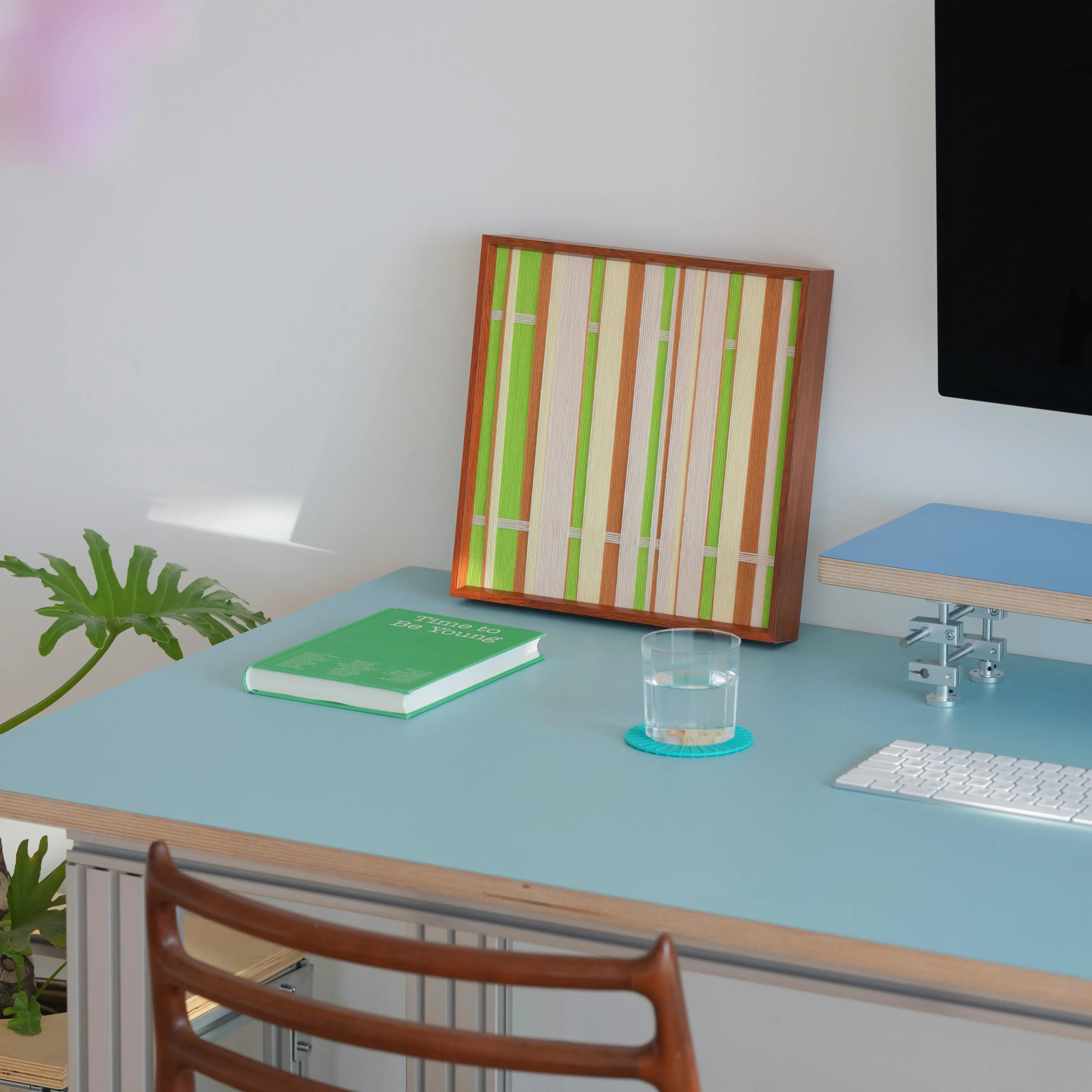 Tree Ah Tree wall art on wooden windowsill with natural sunlight streaming in