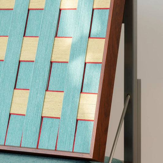 Close-up of Afternoon Window showing textured blue, yellow and muted-red geometric fiber bands