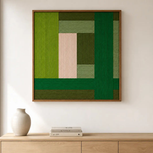 Garden Grid handmade textile wall art displayed above a light wood console in a bright minimalist interior