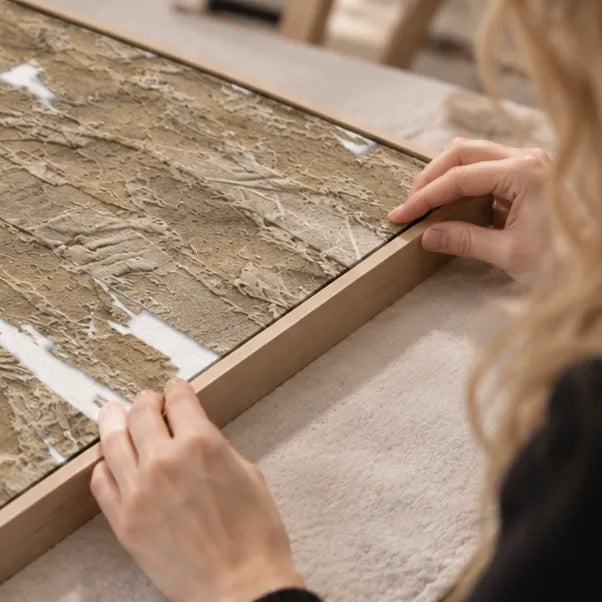 Inspecting a framed art textile