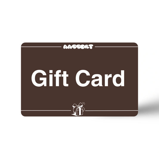 Front view of a brown digital gift card featuring the AASSORT logo and a small gift box icon, redeemable for hand-woven wool wall art.