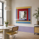 Bohemian Reverie colorful yarn-framed mirror displayed beside a round table in a light modern dining room.