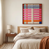 Serene bedroom interior featuring the California Afterglow soft cotton cord fiber artwork mounted above a wooden bed frame with earth-toned bedding.
