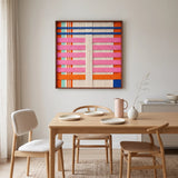 California Afterglow soft cotton cord fiber artwork styled as a stunning focal point above a wooden dining table in a contemporary dining room.