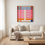 Bright modern living room with the California Afterglow soft cotton cord fiber artwork hung elegantly as a centerpiece above a soft white sofa.