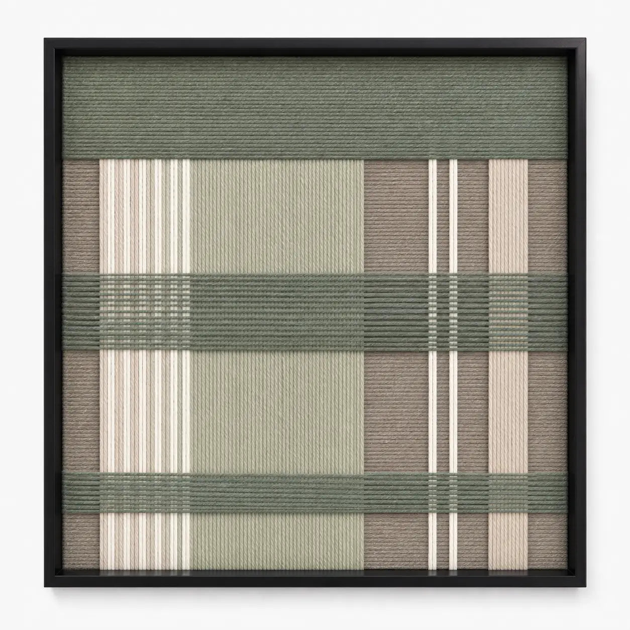 Frontal studio shot of the Celadon Mist square hand-woven textile wall art featuring sage green, beige, and cream geometric plaid patterns in a black frame.