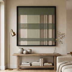Framed Celadon Mist textile wall art displayed in a warm, neutral hallway, hanging above a rustic wooden console table.