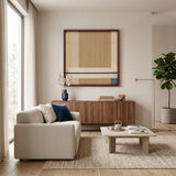 A large-scale textured soft cotton cord wall art piece centered in a spacious, sunlit living room featuring natural wood furniture and minimalist aesthetic.